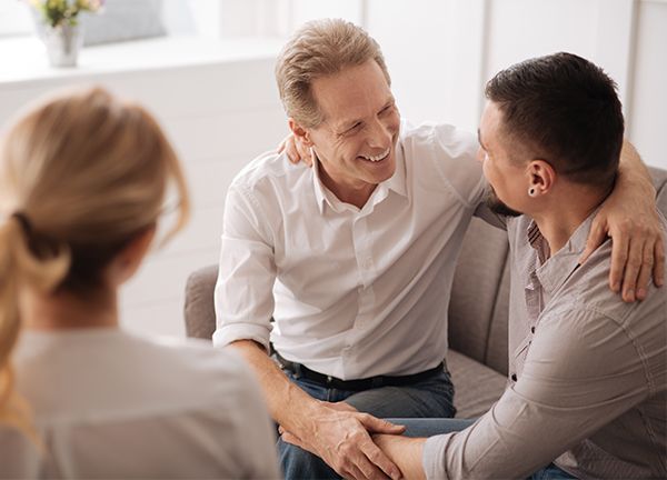 Smiling gay couple
